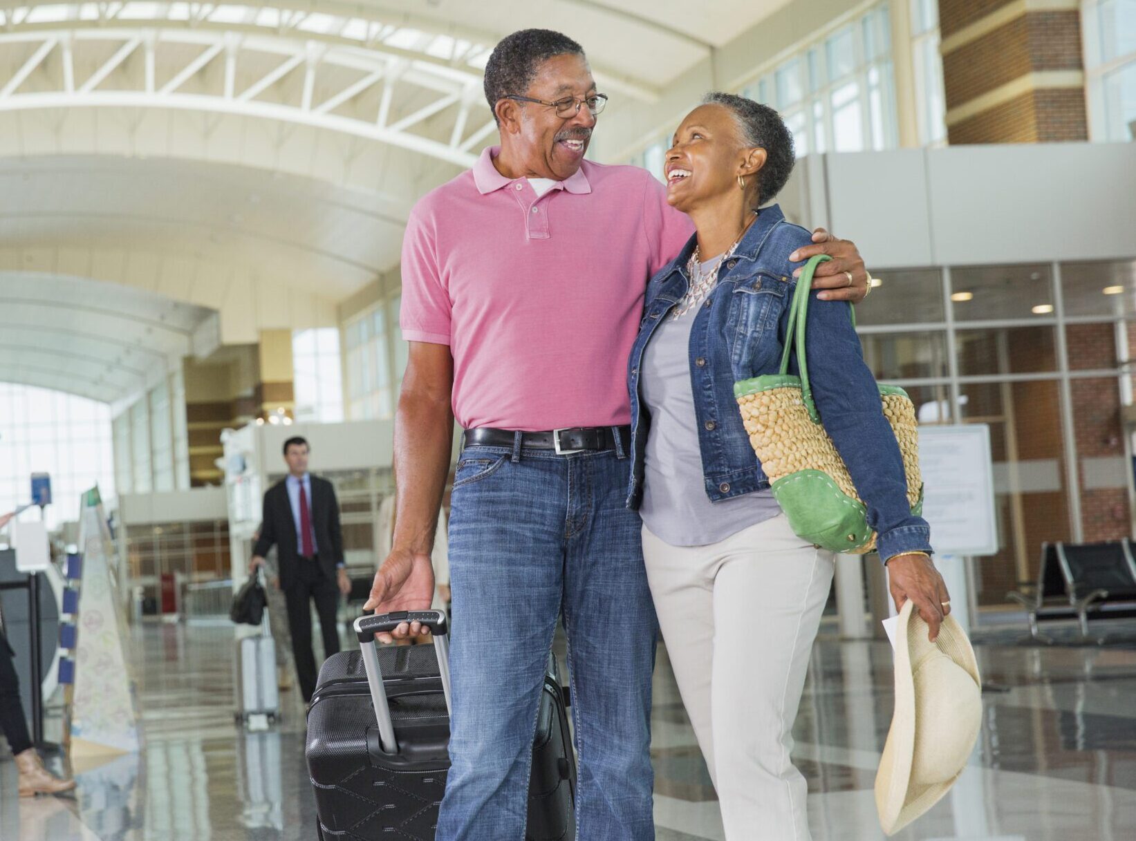 A couple hugging in airport