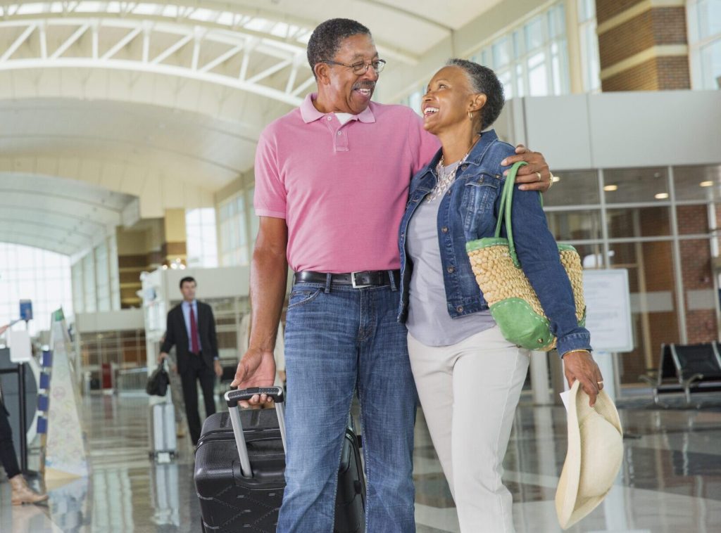 A couple hugging in airport