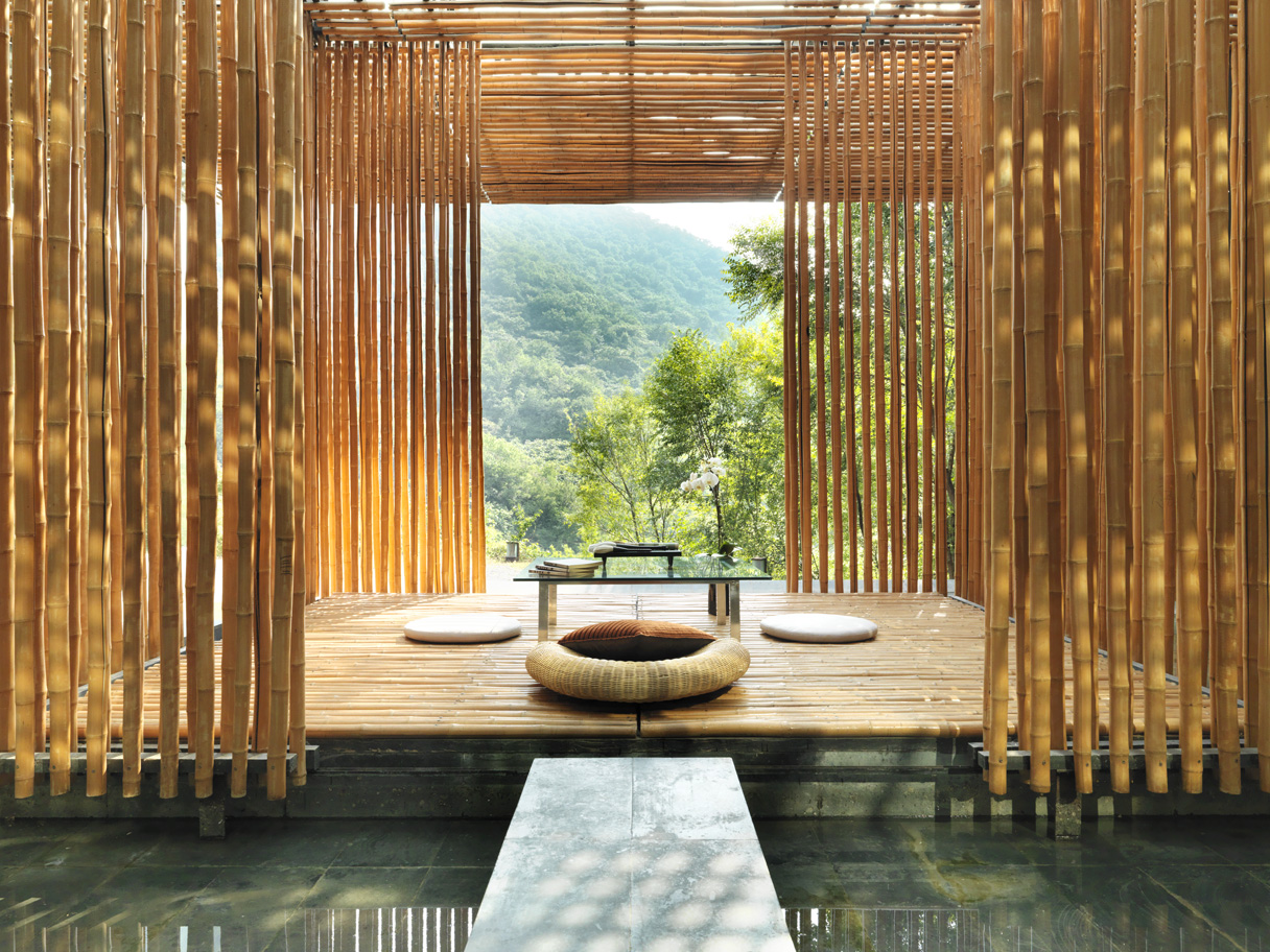 a pretty forest scene with a spa and a bamboo wall at Commune by the Great Wall in the Yangqing District of Beijing, marking the sixth property in China for The Unbound Collection by Hyatt brand