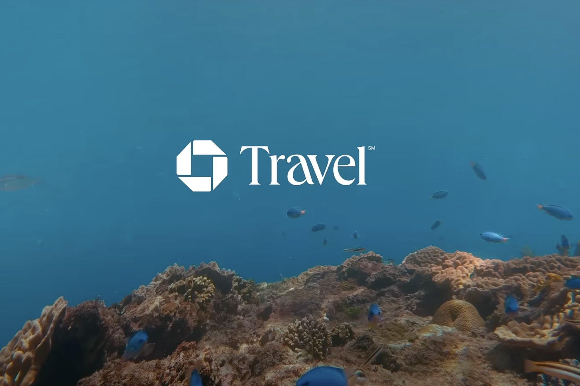 A picture of the Chase Travel logo with an underwater background.