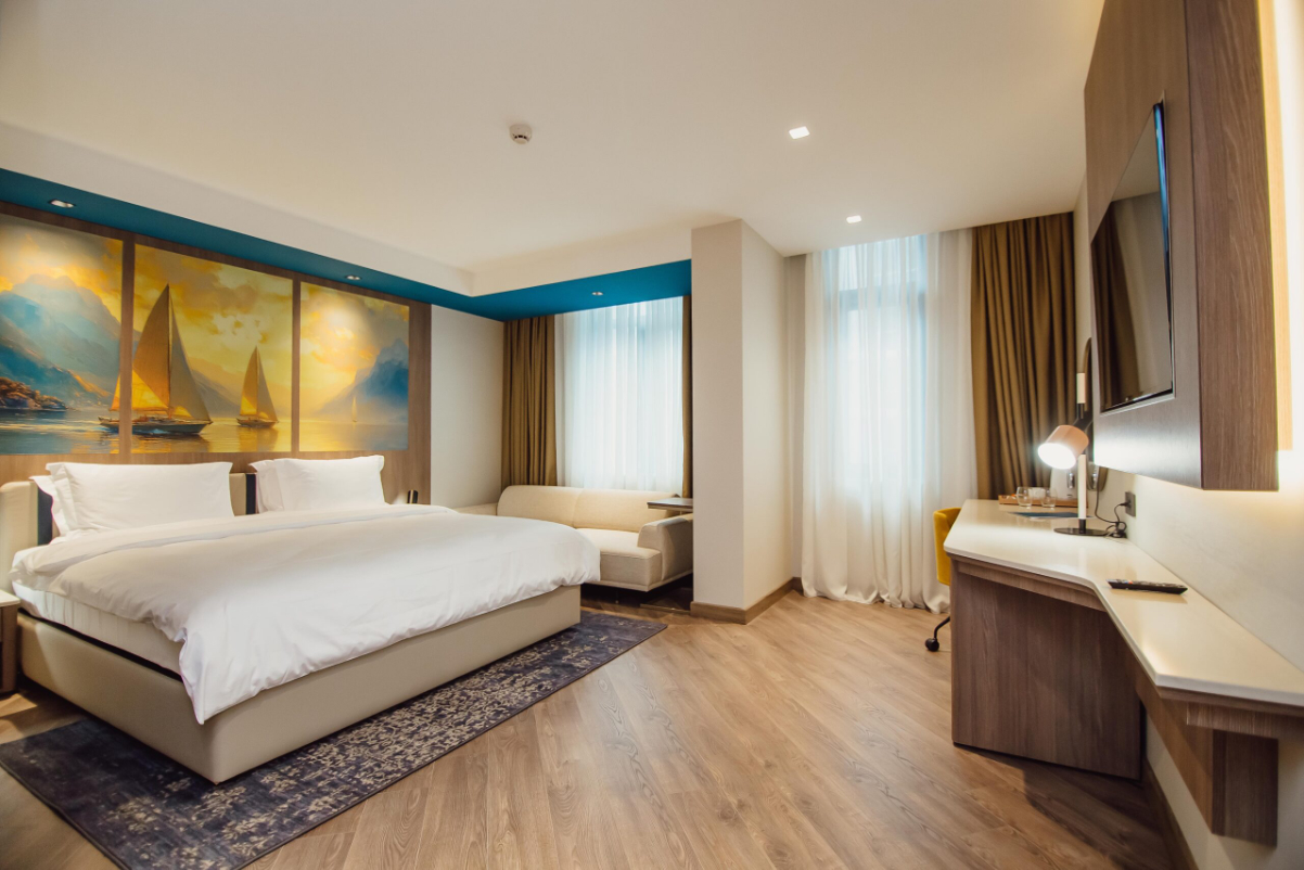 a pleasant looking guest room at a hotel