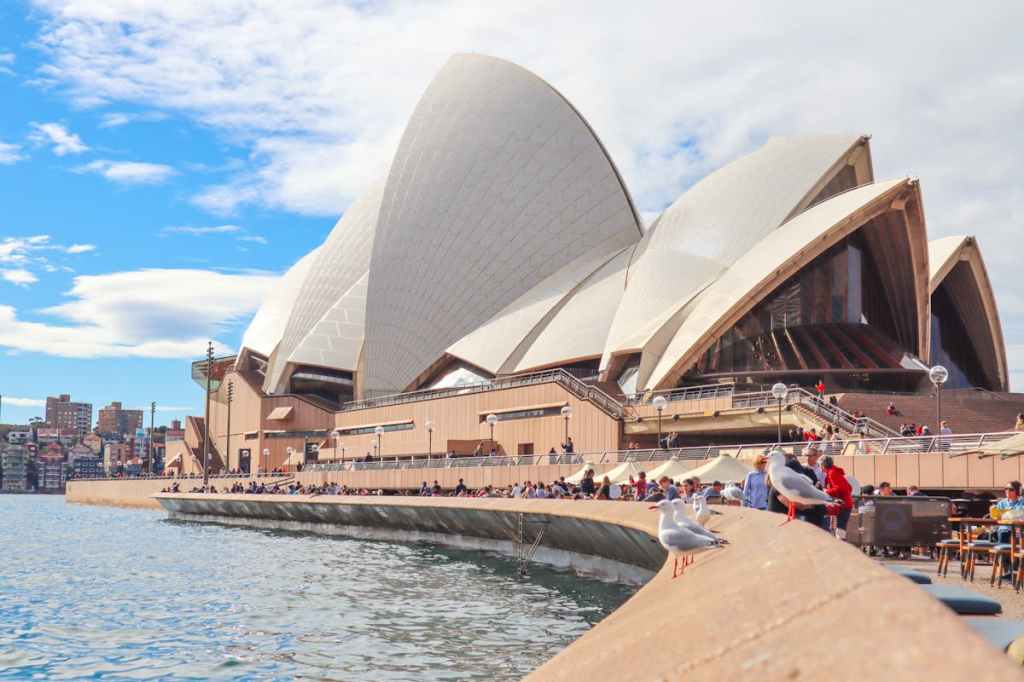 Tourists gathered outside Sydney Opera House in Australia.