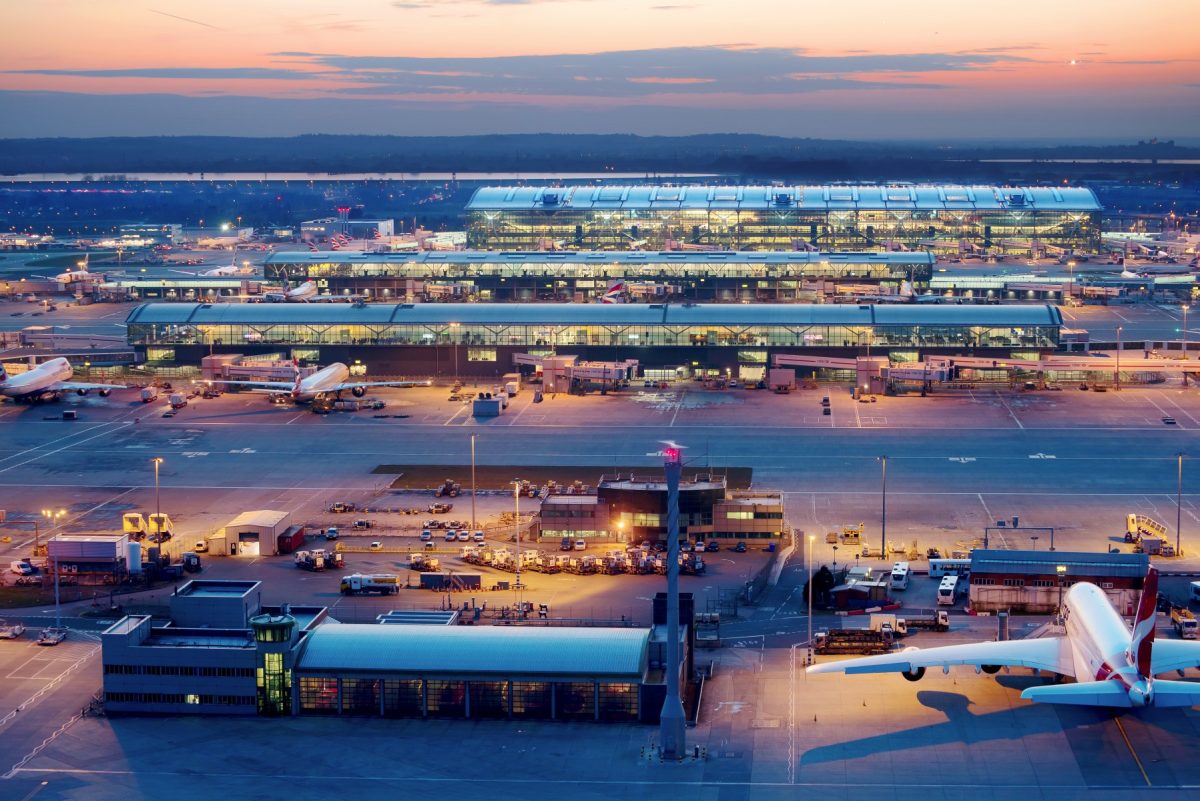 Planes at Heathrow airport during sunset