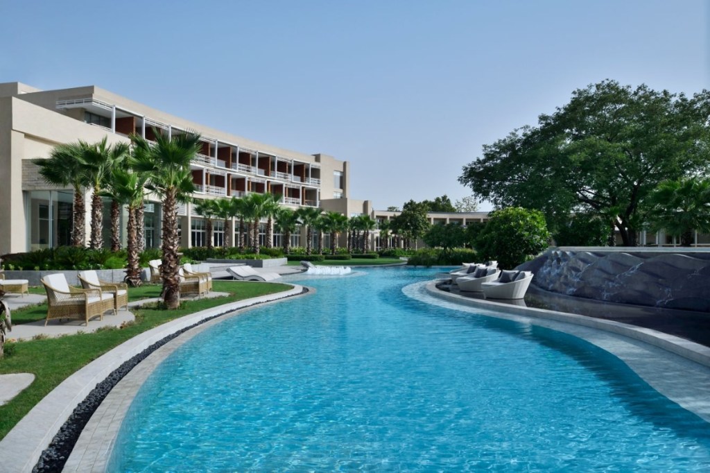 Pool view of Courtyard by Marriott Aravali Resort in Delhi-NCR.