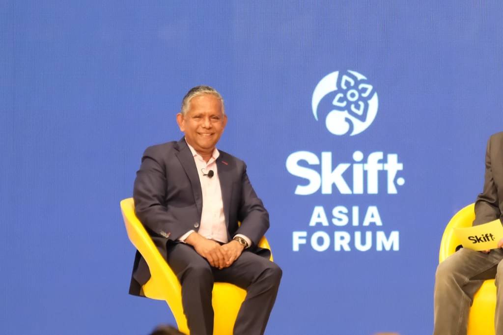 A person speaking on stage
