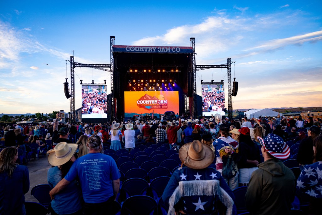view of concert goers at an outdoor country music festival