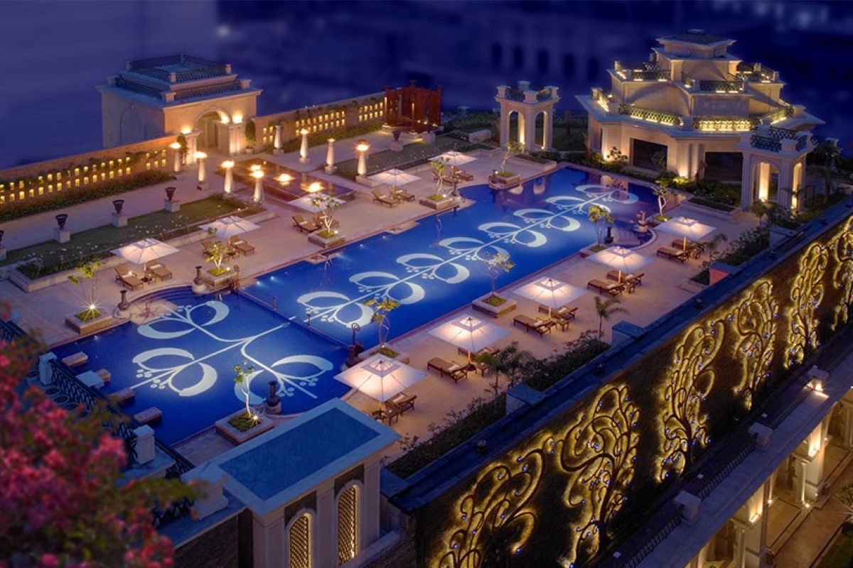 Aerial view of the swimming pool at The Leela Palace Chennai.