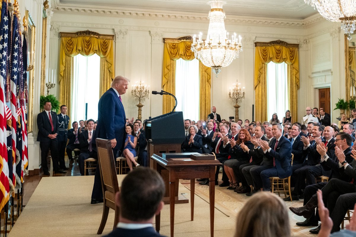 President Donald Trump speaks to supporters inside The White House