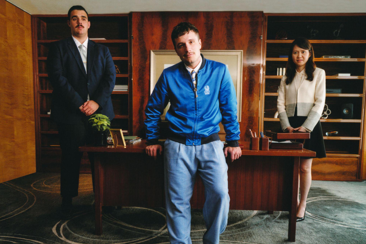 image of actors in an ad for a luxury hotel brand, Ritz Carlton