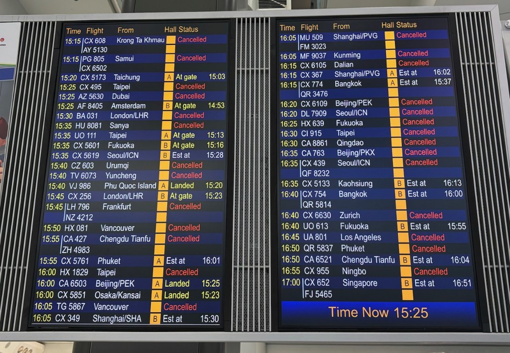 An arrivals board at Hong Kong International Airport ahead of Typhoon Ragasa.