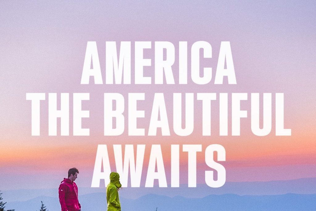 An image from Brand USA's America the Beautiful campaign features two people hiking below text reading "America the Beautiful Awaits."