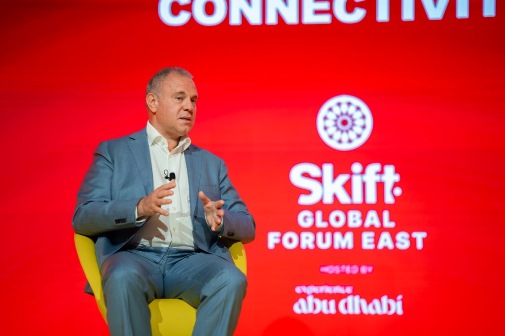 a man speaking on stage