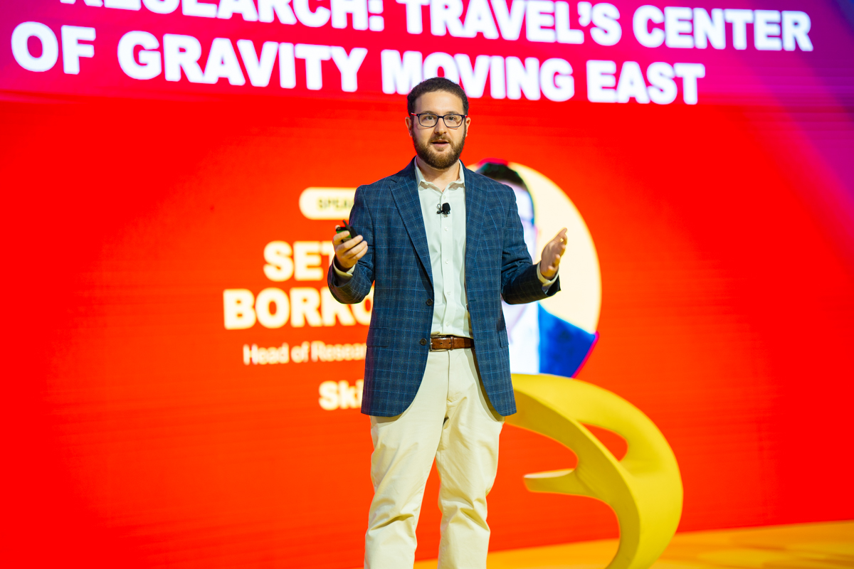 a man speaking on stage