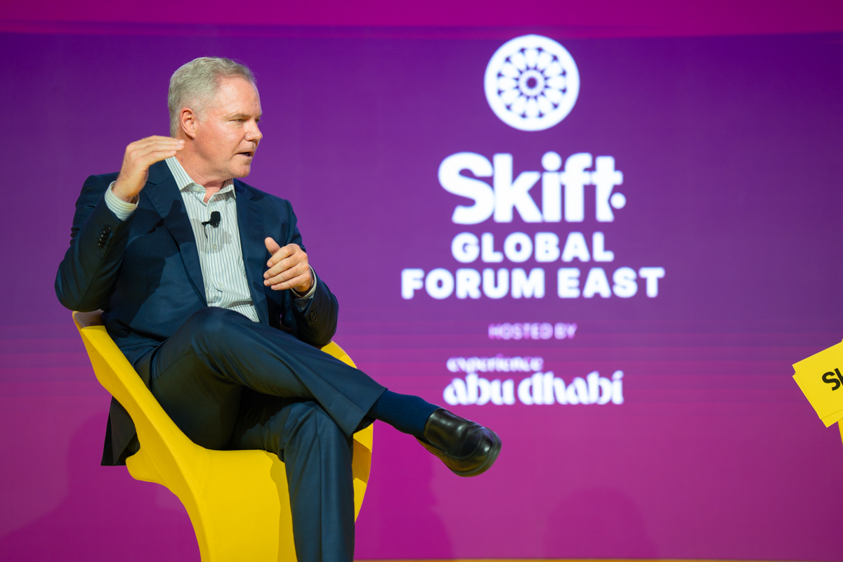 a man speaking on stage