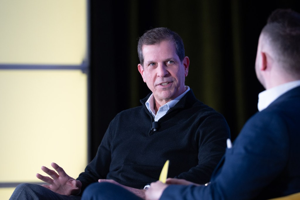 United Airlines Chief Customer Officer and Senior Vice President of Airport Operations David Kinzelman and moderator Gordon Smith on stage at Skift Aviation Forum 2025 in Fort Worth, Texas.