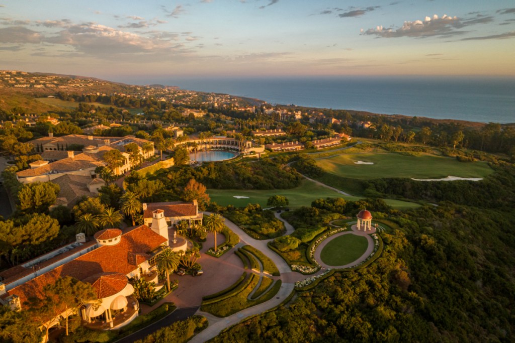 Overhead shot at sunrise of a luxury resort along the water in California