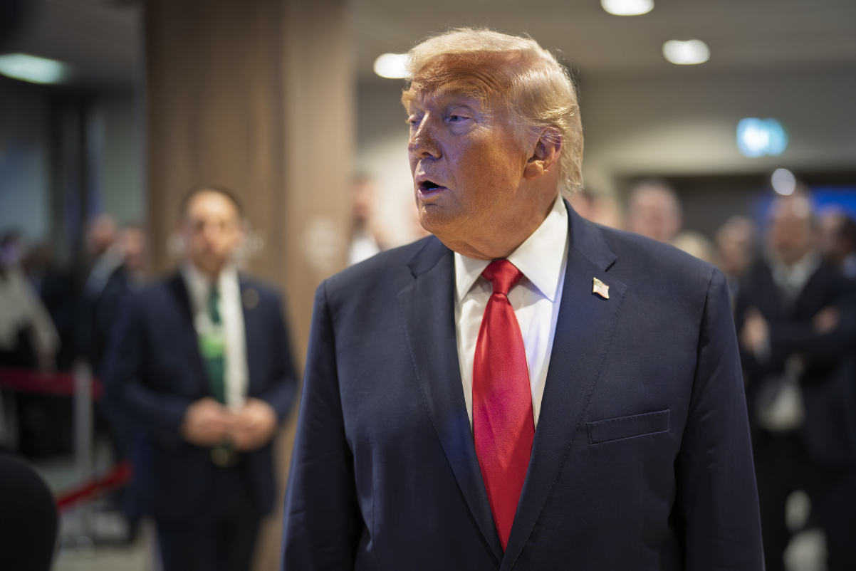 An image of President Trump talking to reporters at Davos in January 2026