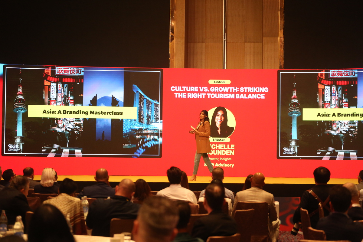Michelle Gounden Director of Insights at Skift Advisory on stage at Skift Asia Forum
