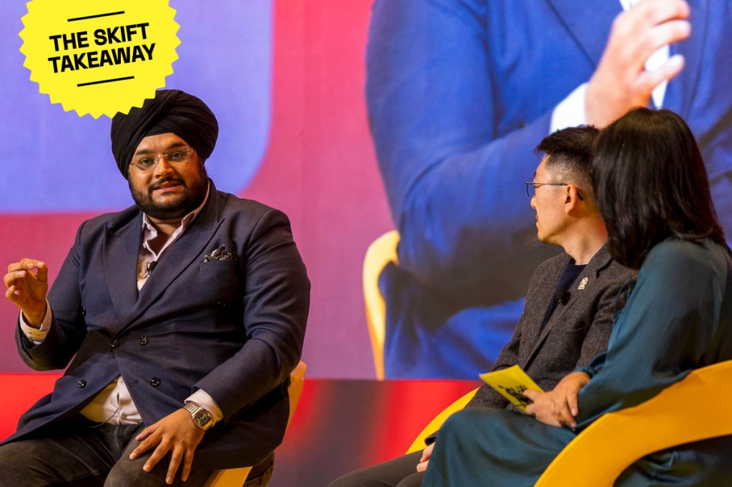 Tejveer Singh Bedi (L), Traveloka VP of Commercial, and David Liu (C), Klook Chief Customer Experience Officer, speaking at Skift Asia Forum on April 29, 2026 in Bangkok.