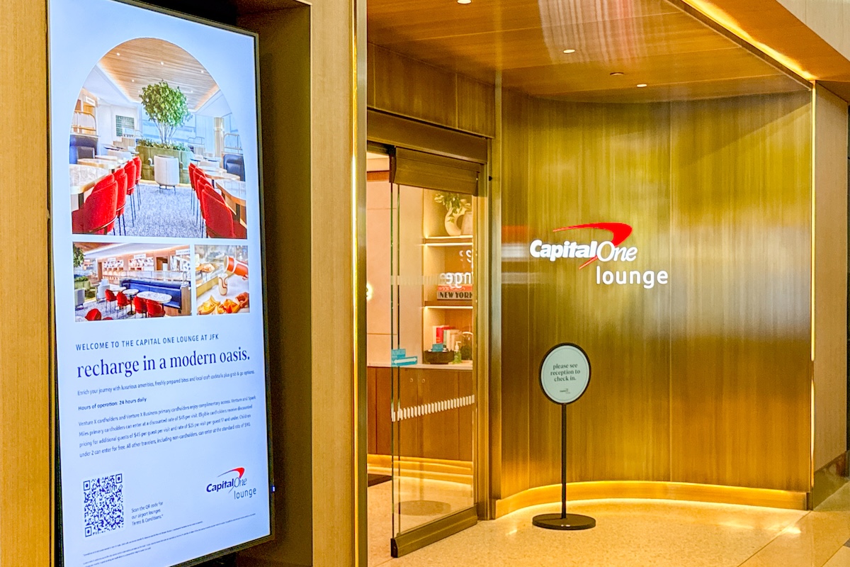 gold-colored entrance to an airport lounge.