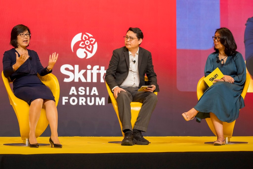 H World's Jihong He, Trip.com's Boon Sian Chai on stage at Skift Asia Forum on April 29, 2026 in Bangkok.