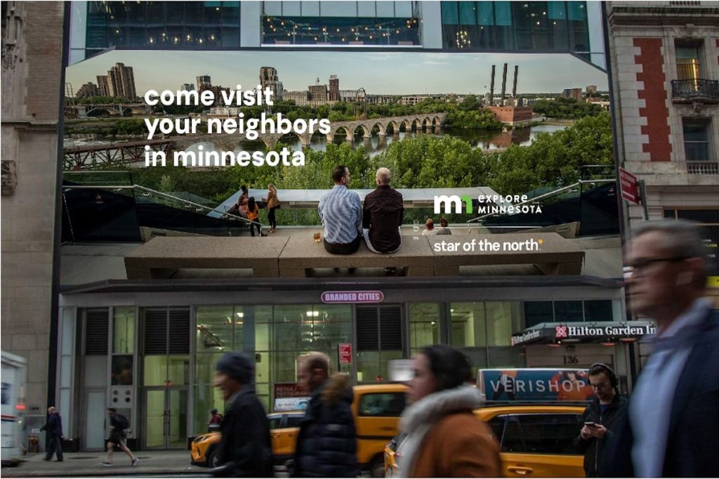 A billboard for Explore Minnesota in New York City.