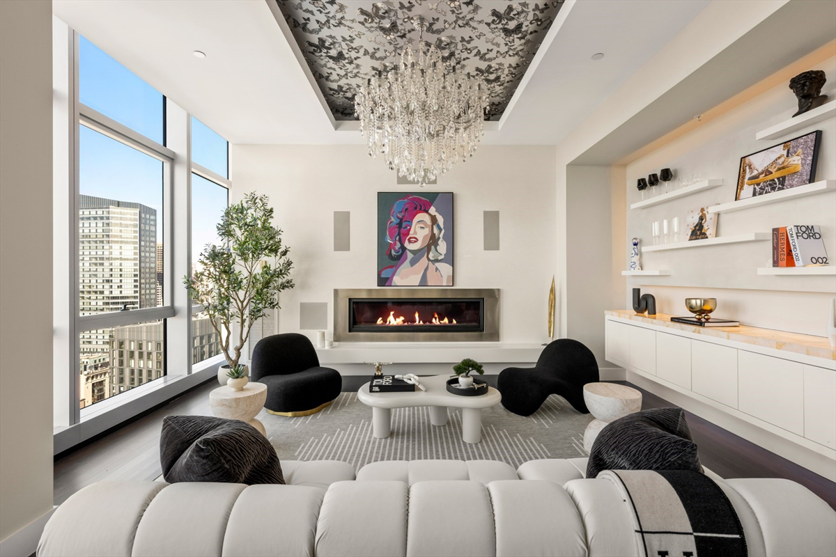 inside a branded residential apartment rental run under the W Hotels brand with eye-catching furniture and built-in shelves and unusual modern art on the walls